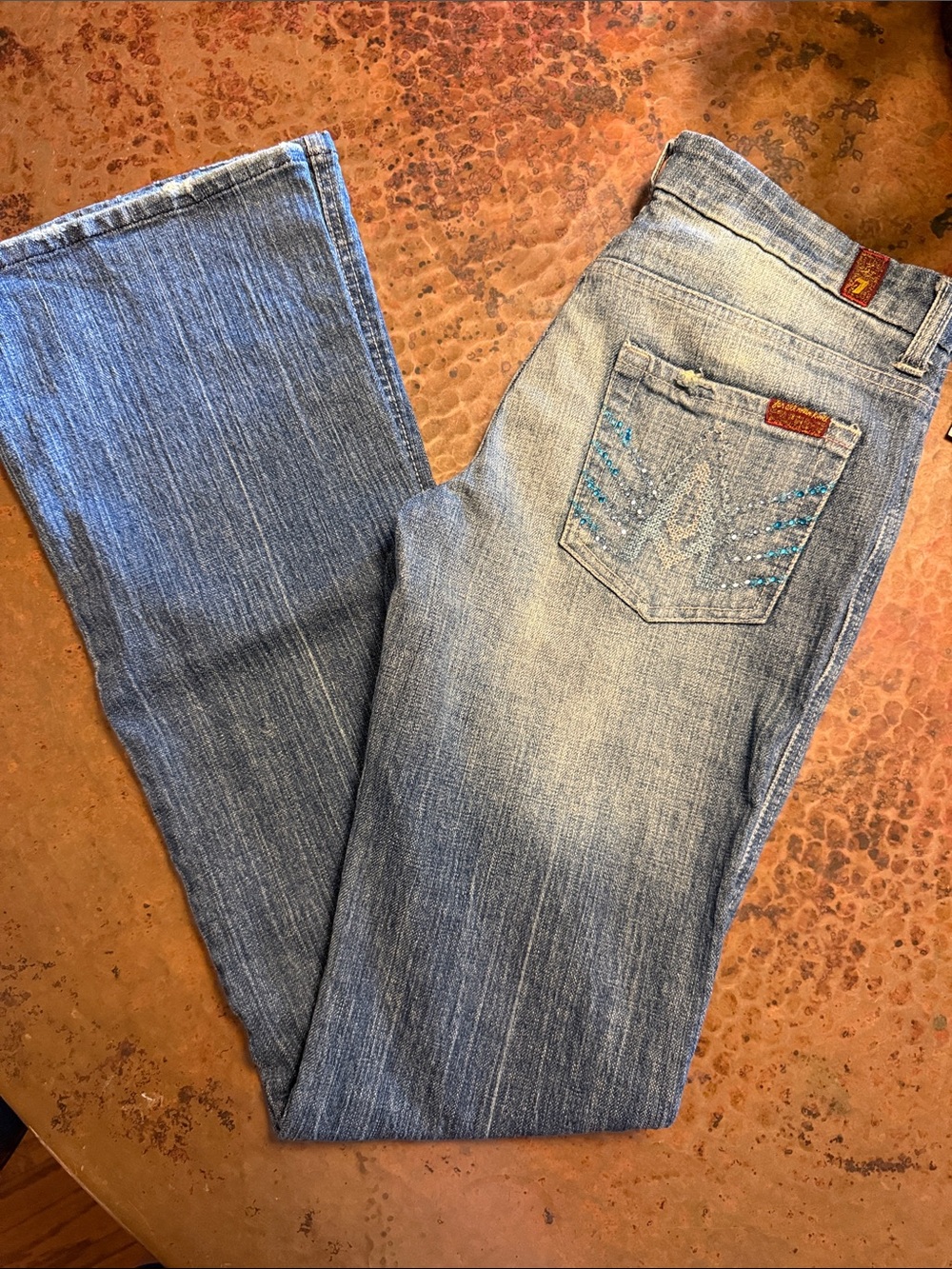 7 For All Mankind Light Blue Boot Cut Jeans with Embellished Back Pocket